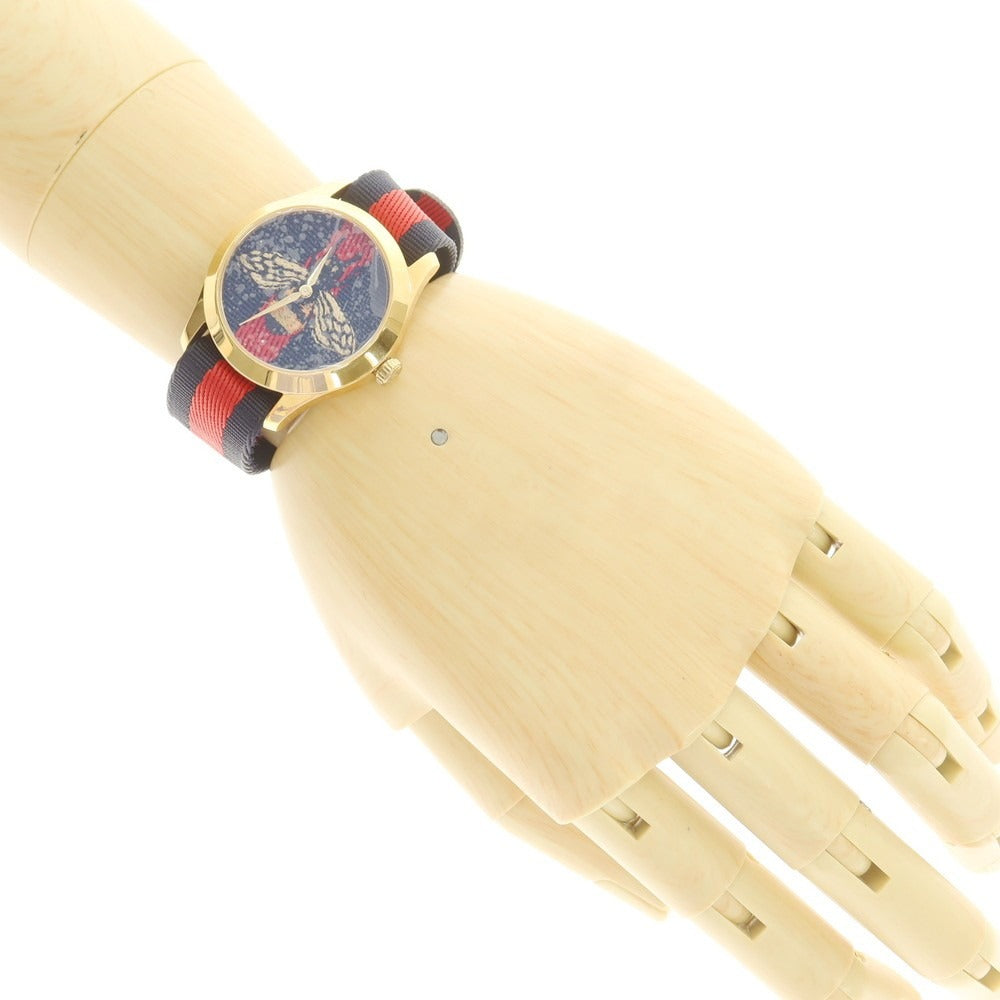 【中古】【未使用】グッチ GUCCI タイムレスG BEE 腕時計 ゴールドxネイビー【 状態ランクS 】【 ユニセックス 】[CPD]