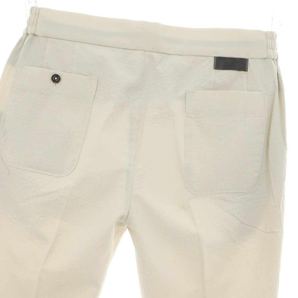 【中古】ザ チノ リヴァイブド THE CHINO REVIVED コットンポリエステル シアサッカー チェック イージースラックスパンツ ライトベージュ系【 85 】【 状態ランクA 】【 メンズ 】
