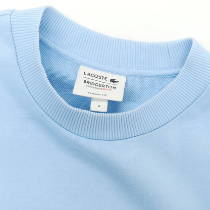 【中古】ラコステ LACOSTE × NETFLIX BRIDGERTON コットン クルーネック スウェット ライトブルー【 4 】【 状態ランクC 】【 メンズ 】