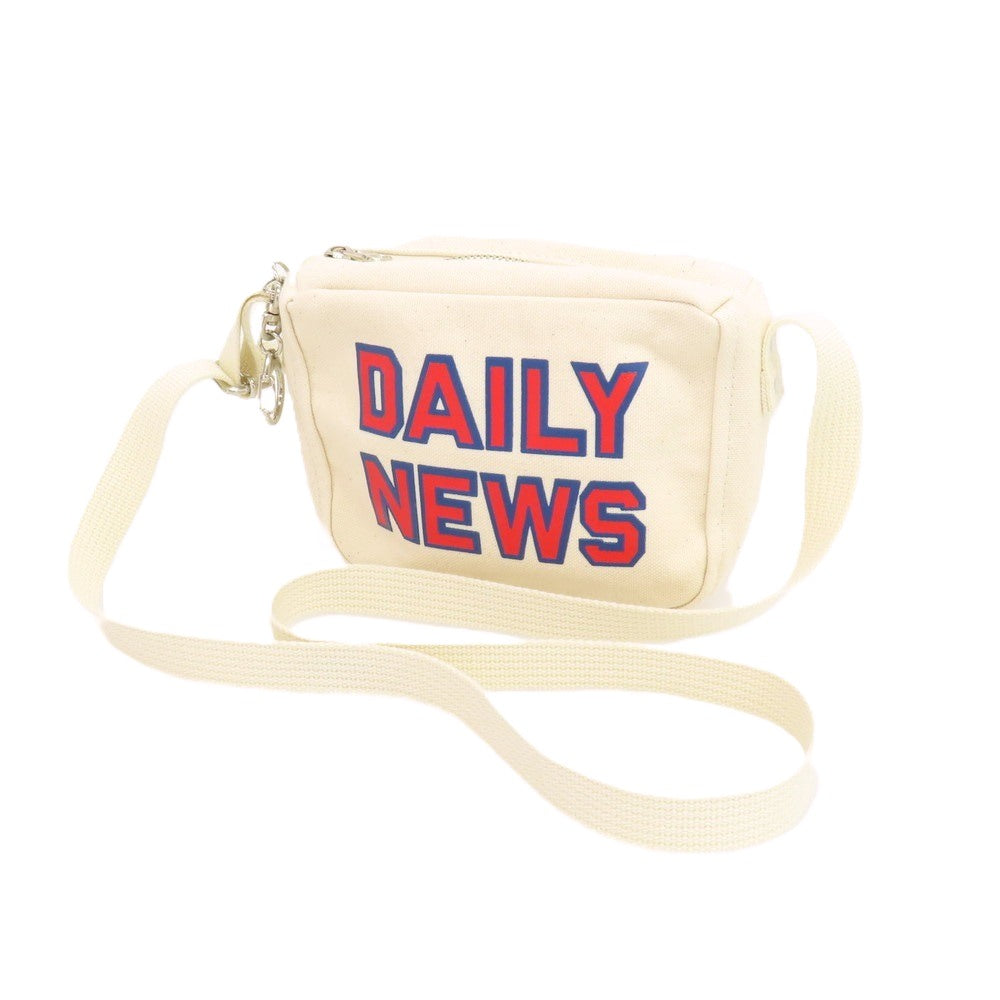 【中古】アンライクリー UNLIKELY 2026年春夏 コットン キャンバス DAILY NEWS ロゴプリント ショルダーバッグ ナチュラル【 状態ランクA 】【 メンズ 】