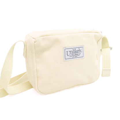 【中古】アンライクリー UNLIKELY 2026年春夏 コットン キャンバス DAILY NEWS ロゴプリント ショルダーバッグ ナチュラル【 状態ランクA 】【 メンズ 】